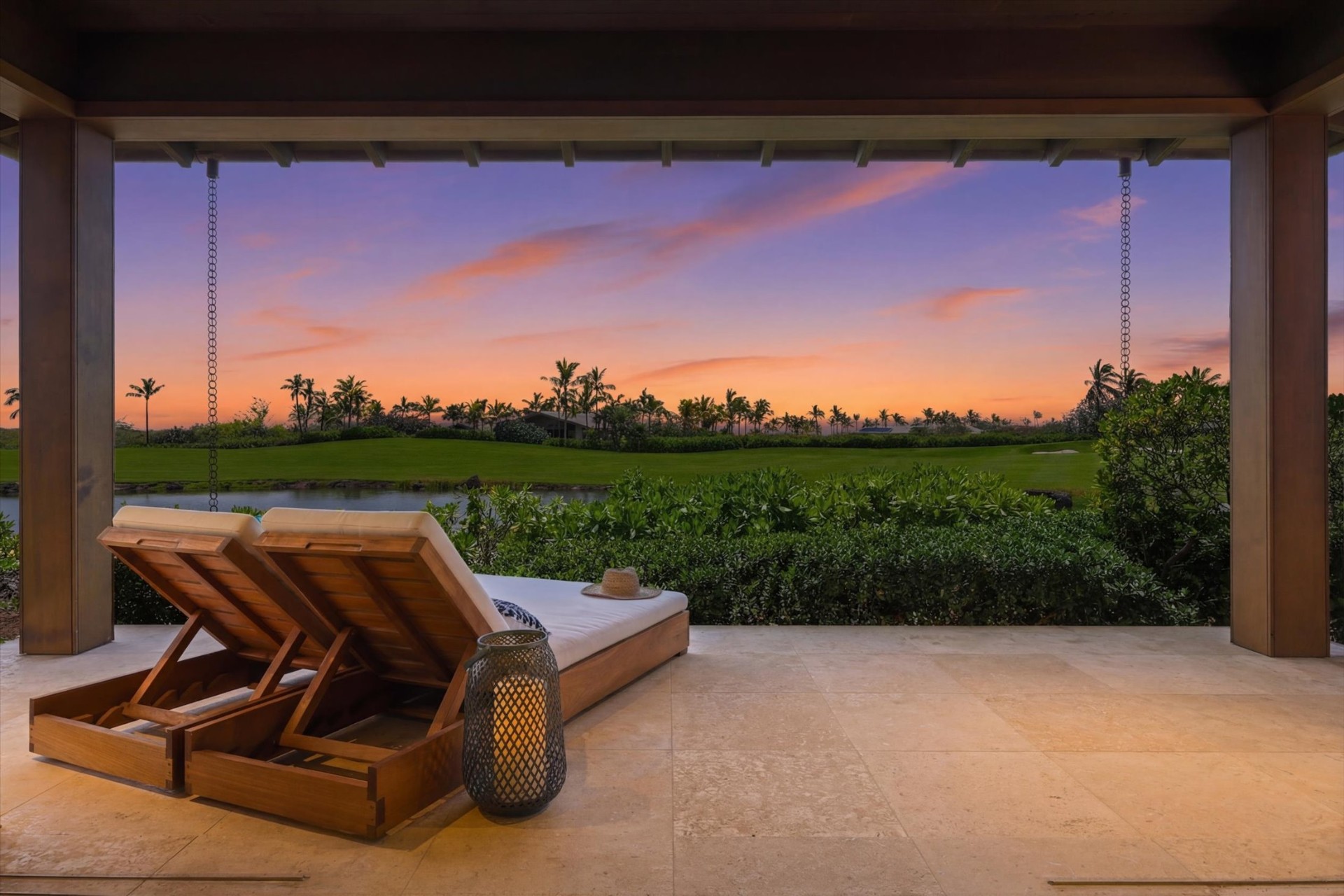 Kohanaiki luxury residence at twilight overlooking the fairway