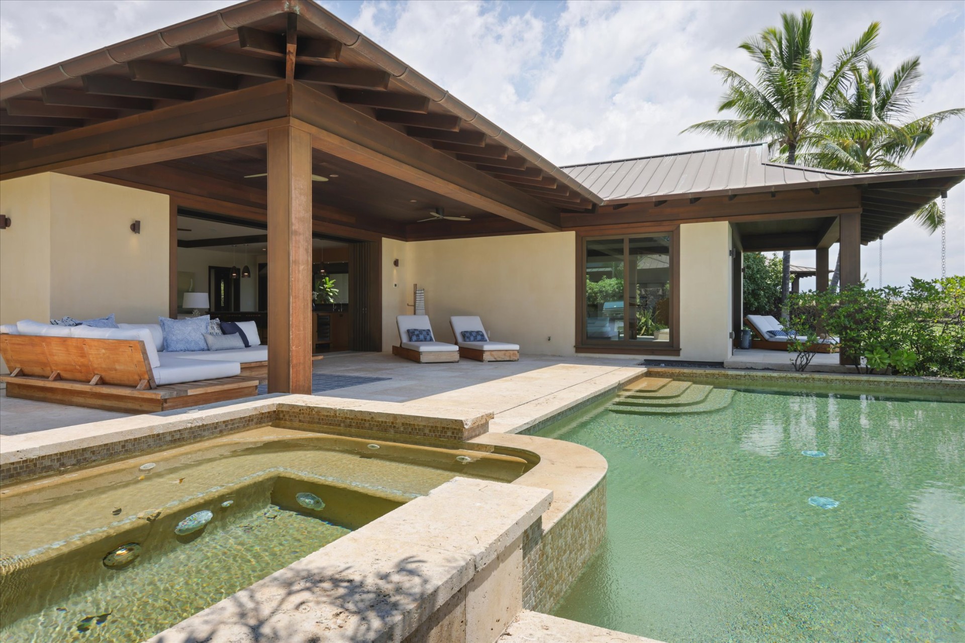 Infinity pool overlooking Kohanaiki golf fairway