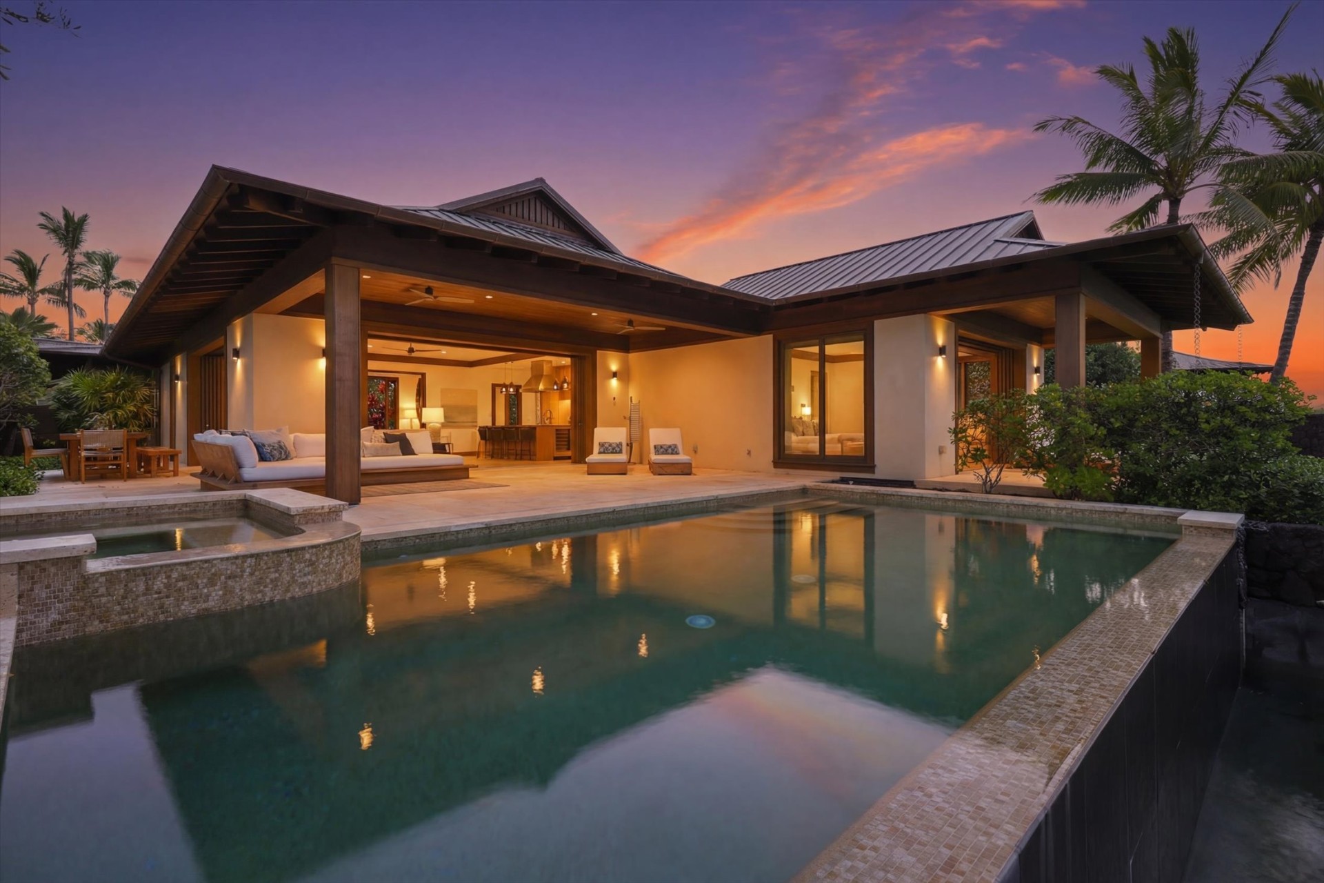 Residence and pool at twilight with sunset sky